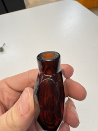 A Chinese facetted amber glass snuff bottle, 19th C.