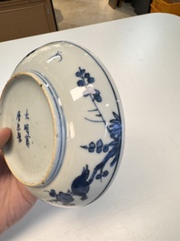 Five Chinese blue and white 'Phoenix' saucers, Wanli mark and of the period