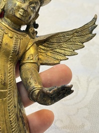A pair of gilt-copper figures of Garuda, possibly Nepal, 17/18th C.
