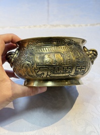 A Chinese bronze 'Journey to the West' censer, Xuande mark, 19th C.