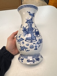 A Chinese blue and white 'Antiquities' wall vase, Kangxi