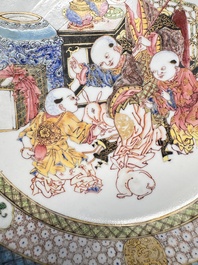 A fine Chinese famille rose eggshell plate with a lady and playing boys, Yongzheng