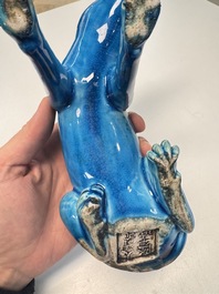 A Chinese turquoise-glazed model of a dog, Qianlong mark, 19th C.