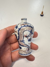 A Chinese blue, white and copper-red 'Dragon' snuff bottle, 19th C.