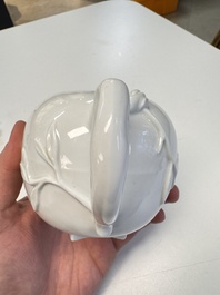 A Chinese Dehua blanc de Chine 'Pomegranate' teapot and cover, Kangxi