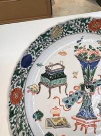 A pair of Chinese famille verte 'Antiquities' dishes, Kangxi