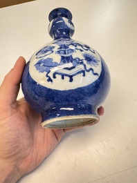A Chinese blue and white powder-blue-ground hookah base, Kangxi