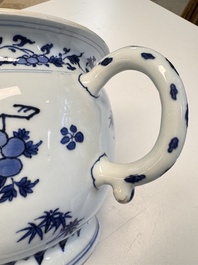 A Chinese blue and white 'Floral' chamber pot, Transitional period