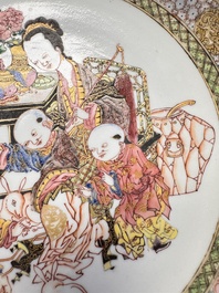 A fine Chinese famille rose eggshell plate with a lady and playing boys, Yongzheng