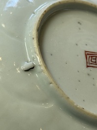 Two Dutch-decorated Chinese cups and saucers with parrots among flowering branches, 18th C.