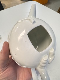 A Chinese Dehua blanc de Chine 'Pomegranate' teapot and cover, Kangxi