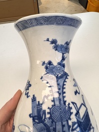 A Chinese blue and white 'Antiquities' wall vase, Kangxi