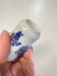 A Chinese blue and white 'Mythical Animals' snuff bottle and a 'Buddhist Lions' snuff bottle, 19th C.