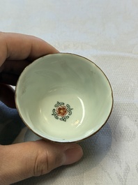 Two Dutch-decorated Chinese cups and saucers with parrots among flowering branches, 18th C.