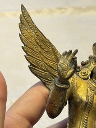 A pair of gilt-copper figures of Garuda, possibly Nepal, 17/18th C.