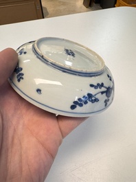 Five Chinese blue and white 'Phoenix' saucers, Wanli mark and of the period