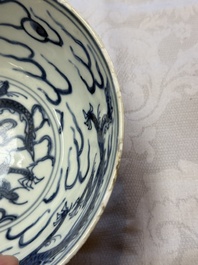 A Chinese blue and white 'Dragons and Clouds' bowl, Jiajing/Wanli