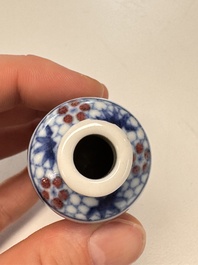 Two Chinese blue, white and copper-red snuff bottles with narrative design, Yongzheng and flower mark, 19th C.