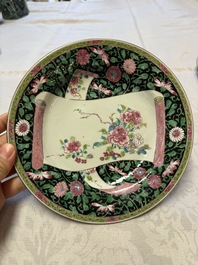 A pair of fine Chinese famille rose black-ground 'Scrolls and Flowers' plates, Yongzheng/Qianlong