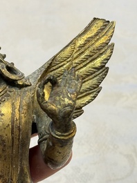 A pair of gilt-copper figures of Garuda, possibly Nepal, 17/18th C.