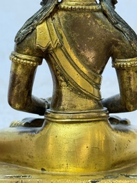 A Sino-Tibetan gilt-bronze figure of Buddha Amitayus, inscribed, Qianlong