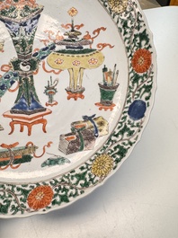 A pair of Chinese famille verte 'Antiquities' dishes, Kangxi