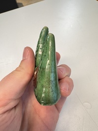 Three Chinese verte biscuit and turquoise-glazed brush rests, Kangxi and later