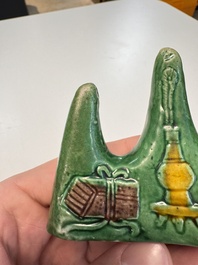 Three Chinese verte biscuit and turquoise-glazed brush rests, Kangxi and later