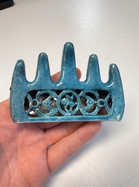 Three Chinese verte biscuit and turquoise-glazed brush rests, Kangxi and later