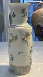 A pair of Chinese famille rose 'Pheasant among Flowering Branches' vases, 19th C.