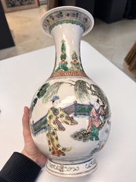 A pair of Chinese famille verte vases with narrative design, 19th C.
