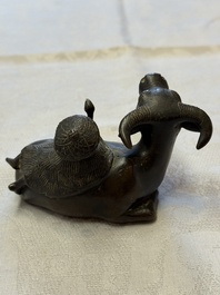 A Chinese bronze 'Boy and Buffalo' paperweight, Ming