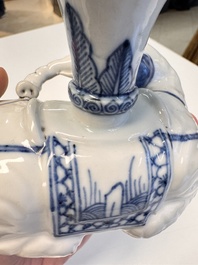 Two Chinese blue and white recumbent elephant-form candlesticks, Jiaqing
