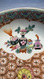 A Chinese qianjiang cai dish and a plate, two famille rose plates and a saucer, Chenghua, Yongzheng and Guangxu marks, 19th C.