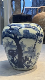 A Chinese blue and white 'Three Friends of Winter' jar with an openworked wooden cover, Transitional period
