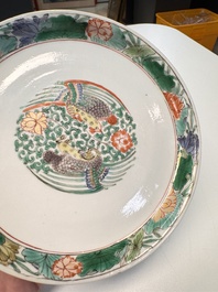 A pair of Chinese famille verte 'cranes' plates, Kangxi