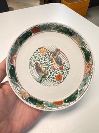 A pair of Chinese famille verte 'cranes' plates, Kangxi