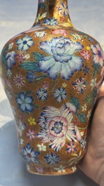 A pair of Chinese famille rose 'Millefleur' vases, Qianlong mark, Republic