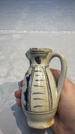 A rare intact early Italian maiolica ewer inscribed 'G', Montelupo, 15th C.