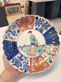A rare pair of Chinese famille verte lobed plates with elegant ladies, Kangxi