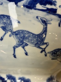 A Chinese blue and white '100 Deers' 'Zun' vase on wooden stand, Kangxi mark, 19th C.