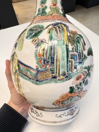 A pair of Chinese famille verte vases with narrative design, 19th C.