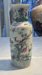A pair of Chinese famille rose 'Pheasant among Flowering Branches' vases, 19th C.