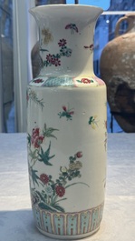 A pair of Chinese famille rose 'Pheasant among Flowering Branches' vases, 19th C.