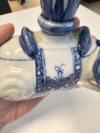 Two Chinese blue and white recumbent elephant-form candlesticks, Jiaqing
