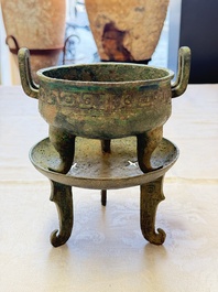 An inscribed Chinese archaic bronze food vessel and stand, You Pan Ding 有盤鼎, Western Zhou