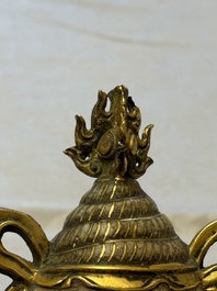 A Chinese parcel-gilt cloisonn&eacute; and bronze 'Conch Shell' Buddhist emblem, 18/19th C.