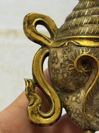 A Chinese parcel-gilt cloisonn&eacute; and bronze 'Conch Shell' Buddhist emblem, 18/19th C.