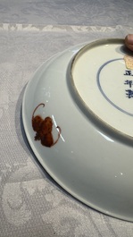 A Chinese qianjiang cai dish and a plate, two famille rose plates and a saucer, Chenghua, Yongzheng and Guangxu marks, 19th C.