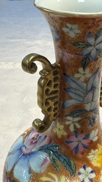 A pair of Chinese famille rose 'Millefleur' vases, Qianlong mark, Republic